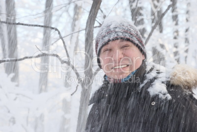 portrait of a man in a winter forest