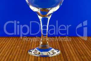 conceptually lighted wine glass on a multicolored background