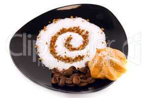 cake and icing sugar on a plate isolated on white