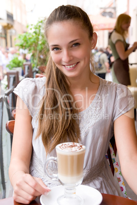 woman with coffee in cafe