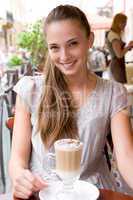 woman with coffee in cafe