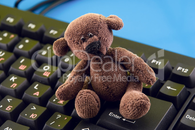 toy on the computer keyboard