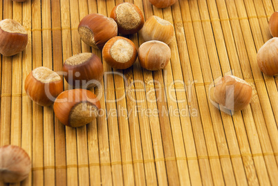 hazelnuts on a bamboo mat