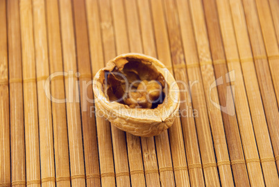 walnut on a bamboo mat