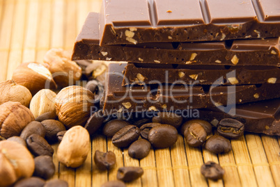 chocolate and nuts on a bamboo mat