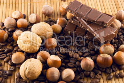 nuts and chocolate on a bamboo mat