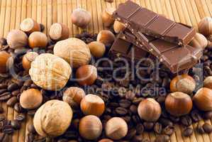 nuts and chocolate on a bamboo mat