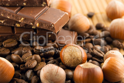 nuts and chocolate on a bamboo mat