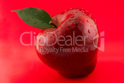 red apple on a red background red apple on a red background