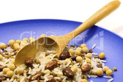 spoon with grain on the plate