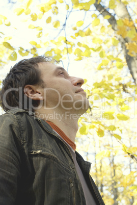 portrait of a man in the autumn forest