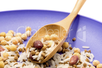 grains in a spoon on a plate