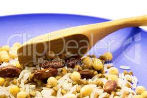 grains in a spoon on a plate