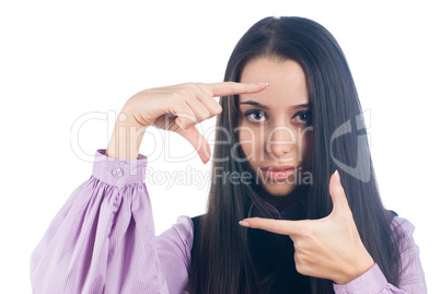 Girl showing frame sign