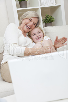 Senior Woman Grandmother & Grandaughter Girl Having Fun With Lap