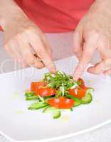 chef decorate plate with food