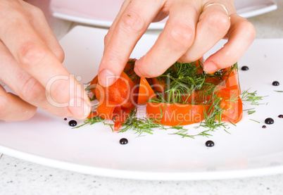 chef decorate plate with food