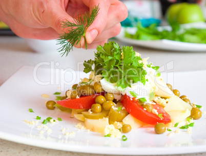 chef decorate plate with food