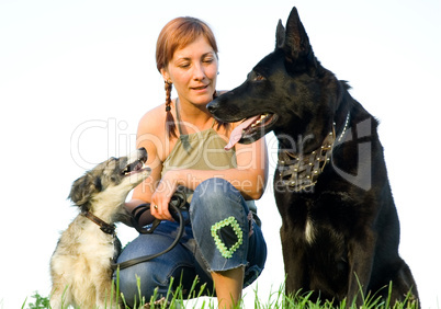 woman with her dog on meadow