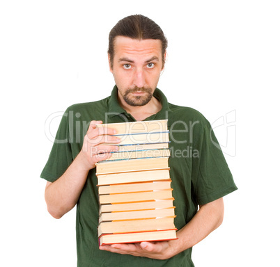 man holding stack of books