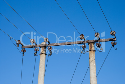 power lines against the blue sky