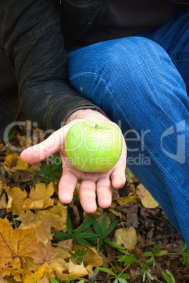 apple in the hands of men