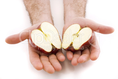 apple in the hands isolated on white