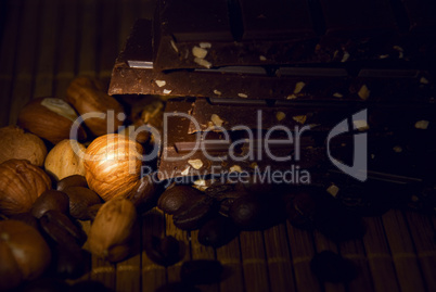 chocolate and coffee beans on a bamboo mat