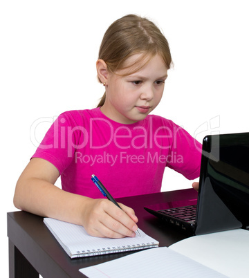 Girl doing homework for a laptop