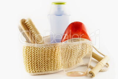 cosmetic containers and  wool isolated on white