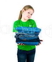 Girl with a pile of jeans