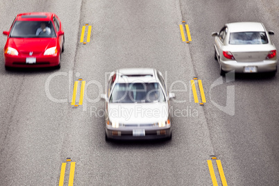 Cars Speeding Along Highway