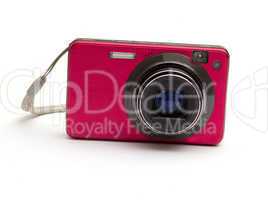 The pink camera isolated on a white background