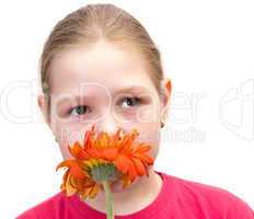The girl with a flower isolated on white