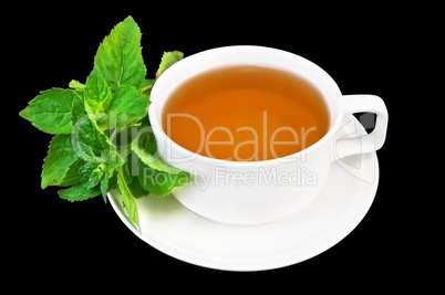 Herbal tea with mint in a white cup