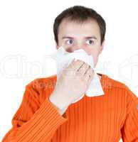 The young man wipes a nose a scarf