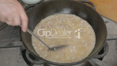 Cooking meat with onion for pilaf