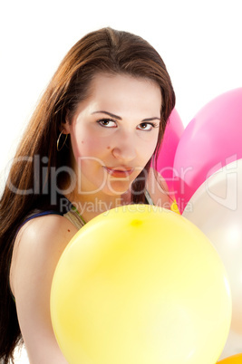 Beautiful woman with multicolored air balloons