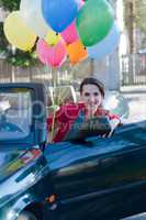 Beautiful brunette woman in car