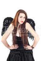 Beautiful brunette woman with black wings