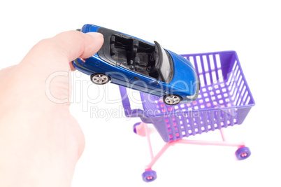 Conceptual photo with car and shopping-cart