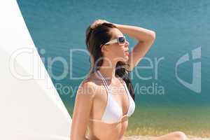 Summer beautiful woman in white bikini bra