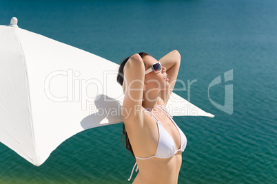 Summer beautiful woman in white bikini bra