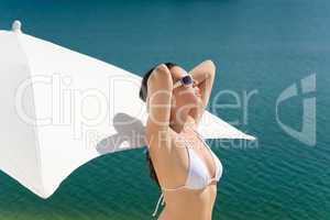 Summer beautiful woman in white bikini bra