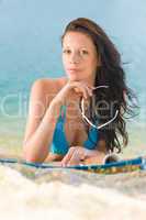 Summer beach woman in blue bikini bra