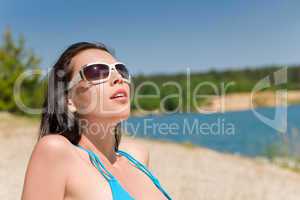 Summer beach woman in blue bikini bra