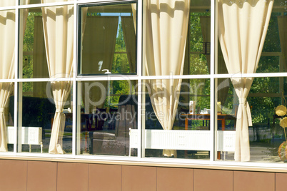 view through the window at the interior of the cafe