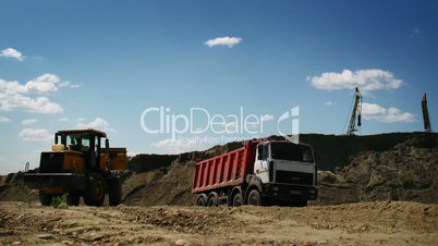 ellow loader working on a construction site