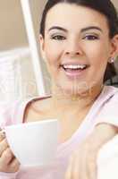 Beautiful Hispanic Latina Woman Drinking Tea or Coffee