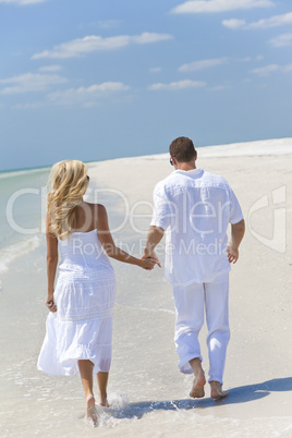 Happy Young Couple Running or Walking Holding Hands on Tropical